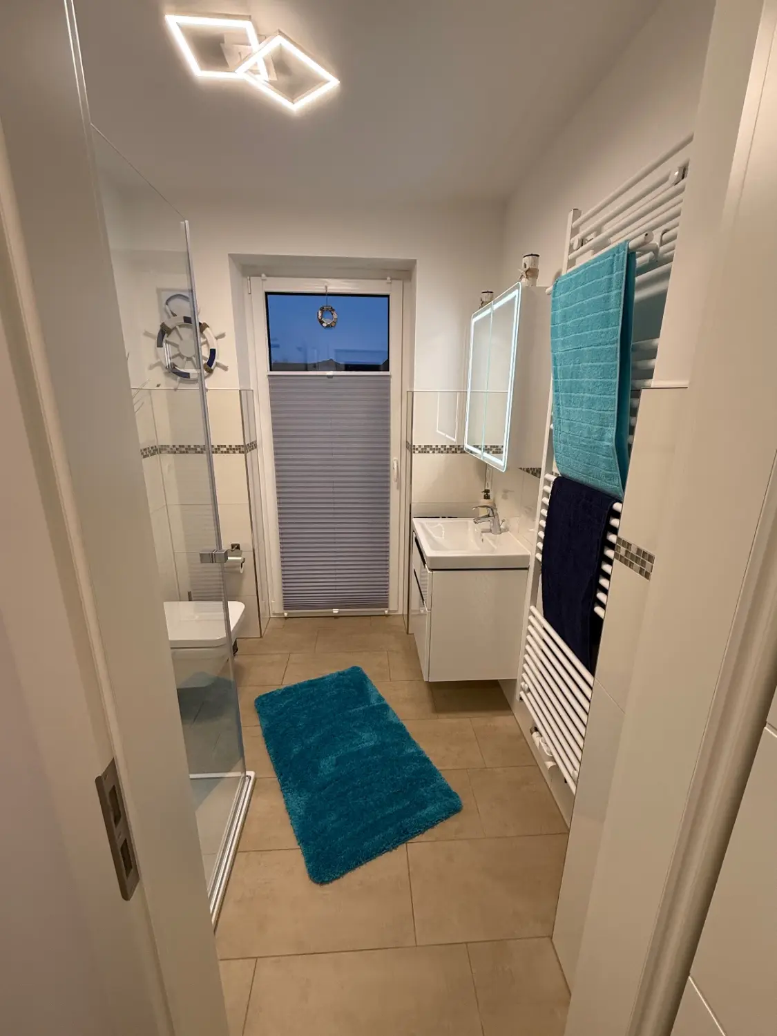 Badezimmer von Ferienwohnung Heimathafen & Hafenkante