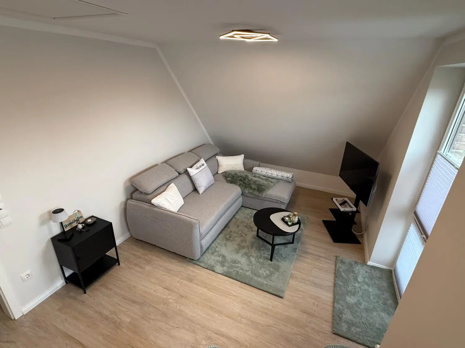 Wohnzimmer von Ferienwohnung Heimathafen & Hafenkante