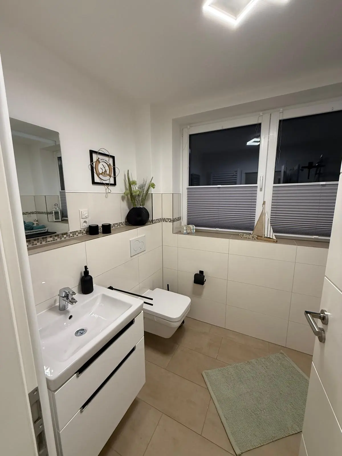 Badezimmer von Ferienwohnung Heimathafen & Hafenkante